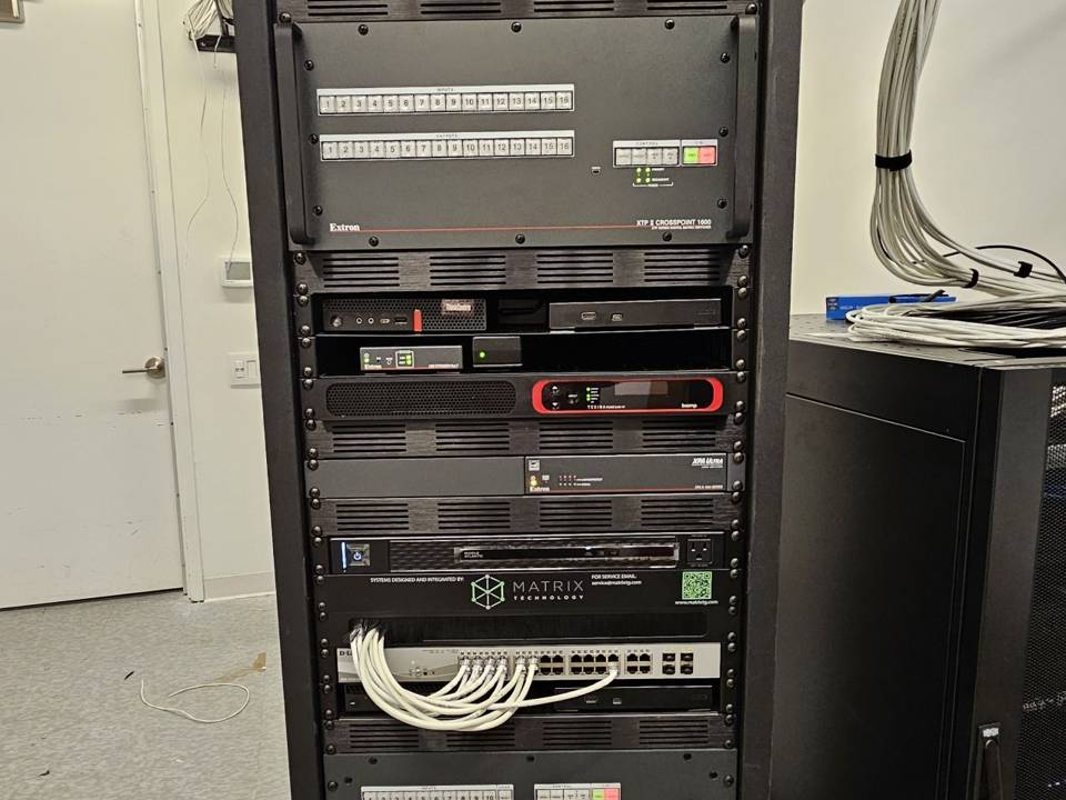 Equipment rack with patch panels, switching and AV processing